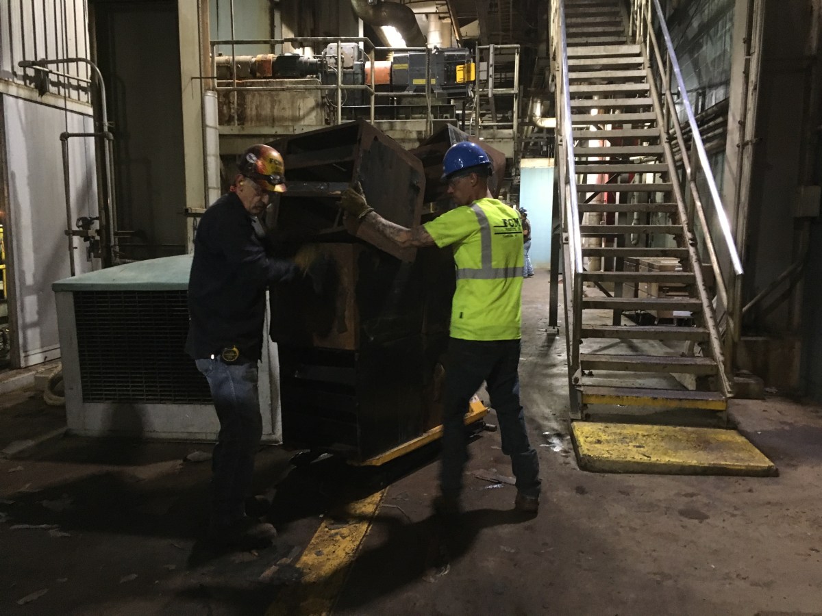 Rusted carbon steel filter rack being removed